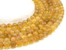 Koraliki z żółtego fluorytu o średnicy 10 mm na drucie 40 cm