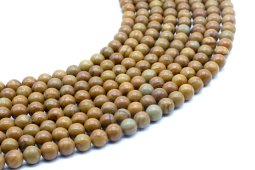 Koraliki z drewna kopalnego 6 mm na nici 40 cm